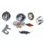 A group of mostly silver jewellery, comprising; eight brooches,