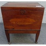 A George III inlaid mahogany rectangular cellarette, on tapering square supports,