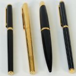 Three various Dunhill fountain pens, one having a pin stripe design,