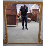 A 19th century French gilt framed overmantel mirror, with lattice and floral moulded frame,