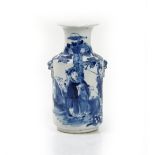 A Chinese blue and white cylindrical vase, early 20th century, set with lion mask and ring handles,