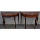 A near pair of George III kingwood banded mahogany 'D' shaped card tables on tapering square