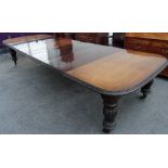 A Victorian mahogany double end extending dining table,