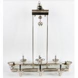An Art Deco style glass and chrome six light pendant light fitting, with star cut glass panel,