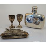 Silver and silver mounted wares, comprising; a curved rectangular spirit flask, Sheffield 1900,