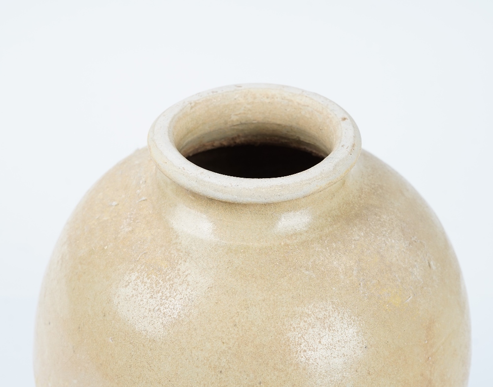 A Chinese Liao style pottery vase, of ovoid form, the top half covered in a deep cream glaze, - Image 2 of 3