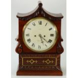 A late Regency rosewood bracket clock, of shaped outline,