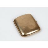 A 9ct gold curved rectangular cigarette case, engraved within and crest engraved to the front,