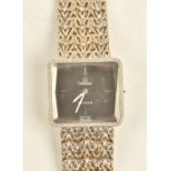 An Omega De Ville white gold rectangular cased ladies bracelet wristwatch,