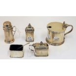 Silver condiments, comprising; a cylindrical mustard pot, London 1928, a three piece condiment set,
