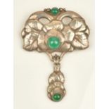 A silver and dyed green chalcedony brooch, in a floral and foliate design,