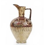 A large Persian lustre pottery jug, 13th century,