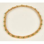 A gold, emerald and diamond necklace, probably European, second half of the 20th century,