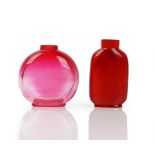 A Chinese pink Peking glass bottle, late 19th/20th century, of discoidal form,