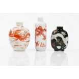 Three Chinese porcelain snuff bottles, late 19th/20th century, comprising; a cylindrical bottle,