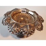 An Austrian pedestal bowl of shaped circular form, the wide rim with stylized scalloped motifs,