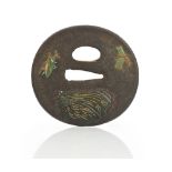 A Japanese oval iron tsuba, Edo period ,19th century,