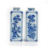 A pair of Chinese blue and white square canisters, in Kangxi style but later,