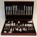 A silver plated canteen of table flatware, comprising; twelve steel bladed table knives,