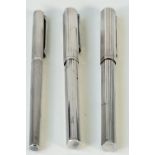 Three Dunhill silver plated fountain pens, (3).