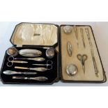 A German manicure set, the eight fittings, including two lidded glass toilet jars, a nail buffer,