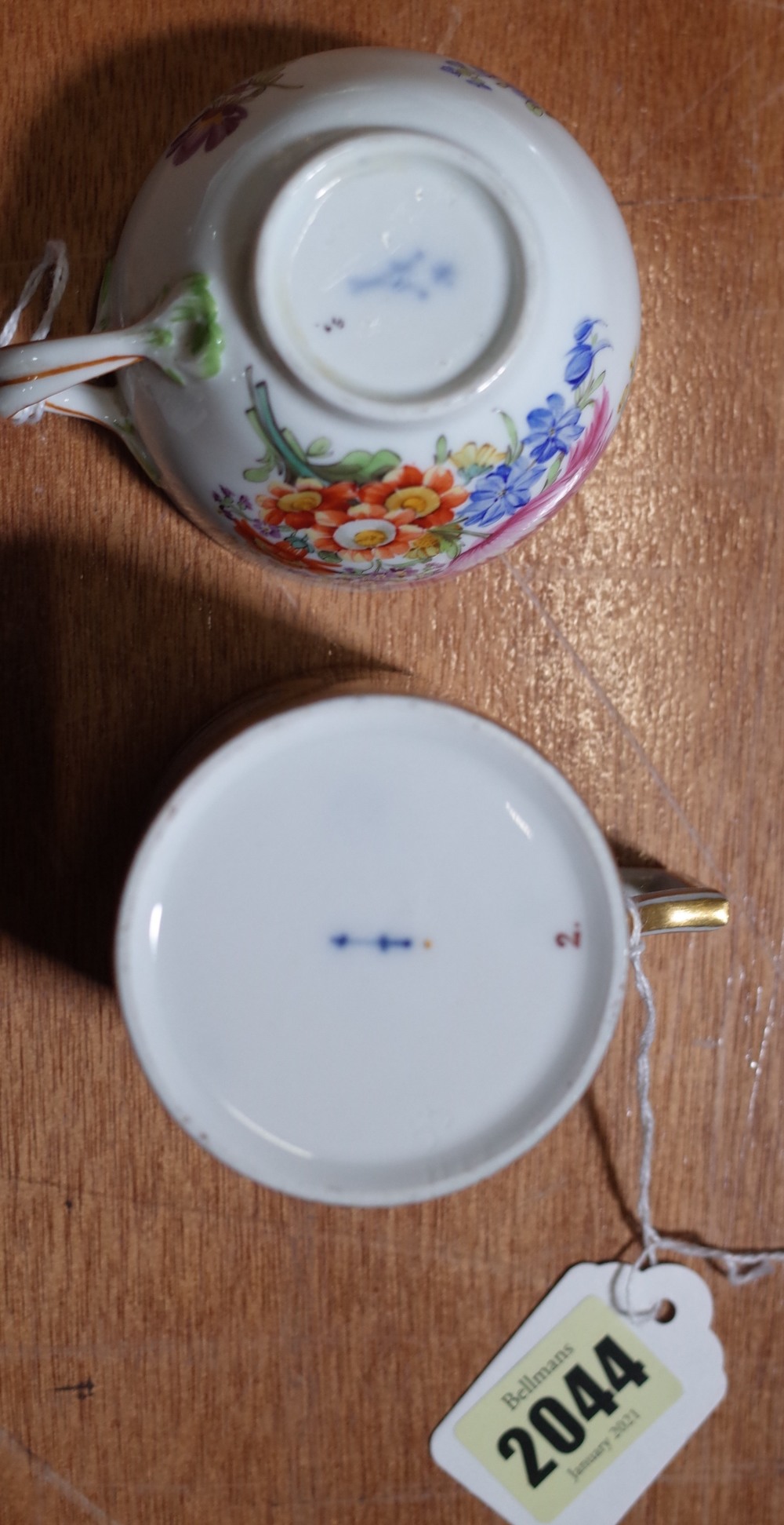 A Berlin porcelain cabinet cup painted with two women and a putto; a Meissen tea cup, - Image 13 of 17