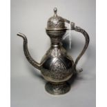 An Indian plated metal coffee pot, of pear shape with hinged dome cover,