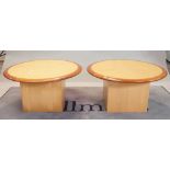 A pair of modern circular low occasional tables on square plinth bases, 80cm diameter x 40cm high,