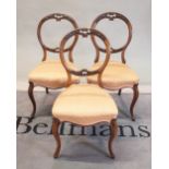 A set of six Victorian walnut balloon back dining chairs, 46cm wide x 90cm high, (6).