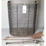 A 19th century nursery fender, 55cm wide and a group of three fire tools, (4).