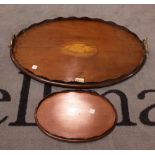 An Edwardian inlaid mahogany twin handled galleried tray, 57cm wide, and another smaller tray,