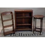 A oak three tier open bookcase, 76cm wide x 91cm high, a four tier waterfall open bookcase,