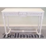 A modern white painted Continental side table with on fluted tapering supports,