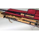 A Hamlin three piece split cane fishing rod, a Shakespeare 'Voyageur' telescope rod,