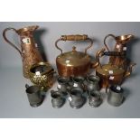 Metalware, comprising; two Art Nouveau copper jugs, the tallest 24cm high,