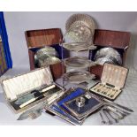 Silver plated wares, including; place mats, photograph frames, bowls and flatware, (qty).