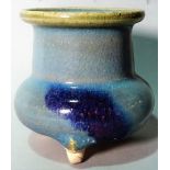 A small Jun type tripod vase, squat form with cylindrical neck and everted rim, 9.5cm. high.