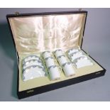 Royal Doulton; six cup and saucers, a cased cut glass decanter and glasses, (qty).