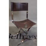 A modern chrome and brown leather side chair on 'X' frame base, 47cm wide x 93cm high.