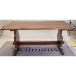 A 17th century style oak refectory table on dual ended supports, 84cm wide x 170cm long.