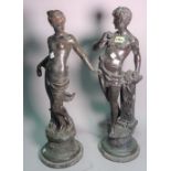 A pair of modern spelter figures in classical poses, 62cm high, a spelter figure group of a god,