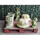 Garden statuary comprising a pair of modern reconstituted stone urns with leaf moulded decoration,