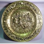 A Victorian single brass embossed circular tray, 72cm diameter.