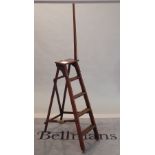 An early 20th century stained beech 'A' frame step ladder, 35cm wide x 212cm high.