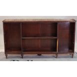 A 19th century mahogany open bookcase with split beading decoration on turned supports ,