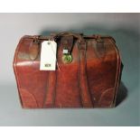 An early 20th century leather doctor's bag, 45cm wide x 33cm high.