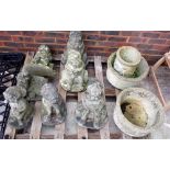 Garden statuary including a pair of modern reconstituted stone pots formed as wicker baskets,