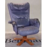 A 20th century hardwood framed low armchair with blue leather upholstery, 86cm wide x 105cm high.