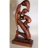 A modern hardwood African figure, 93cm high.