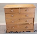 A Victorian pine chest of two short and three long drawers, 104cm wide x 106cm high.